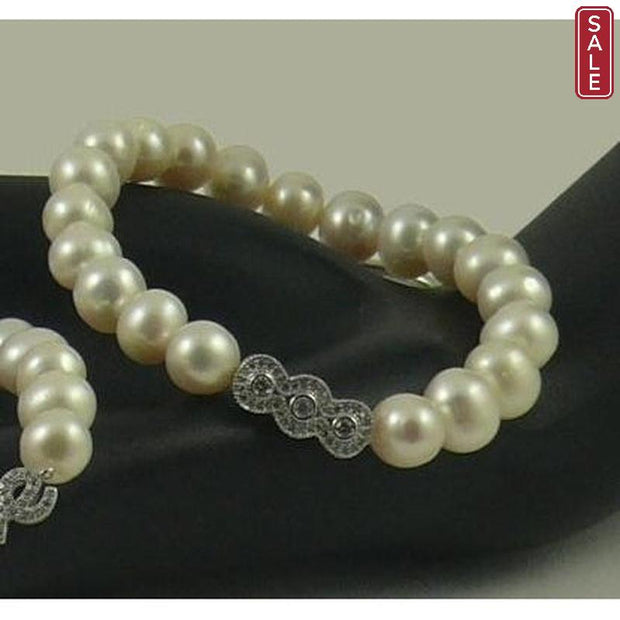 The Real Pearl Co. - White Pearl Elasticated Bracelet with Silver & CZ Triple Circle