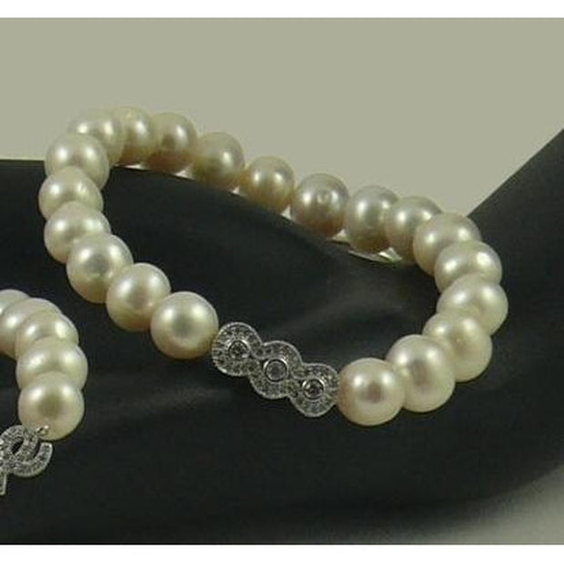 The Real Pearl Co. - White Pearl Elasticated Bracelet with Silver & CZ Triple Circle